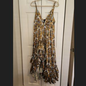 Tropical dress made from sustainable materials. Gold, white and black, Size M